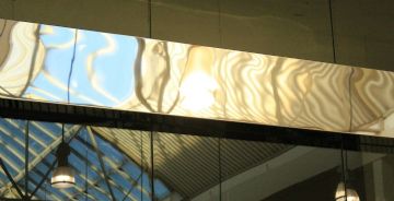 Bookmatched Marble and Backlit Onyx for Luxury Hotel Lobbies