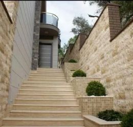 Travertine in Outdoor Spaces: Gardens, Facades, and Pool Areas